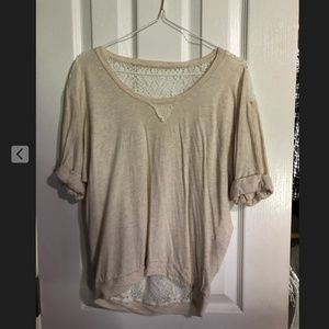 cream colored shirt with lace back